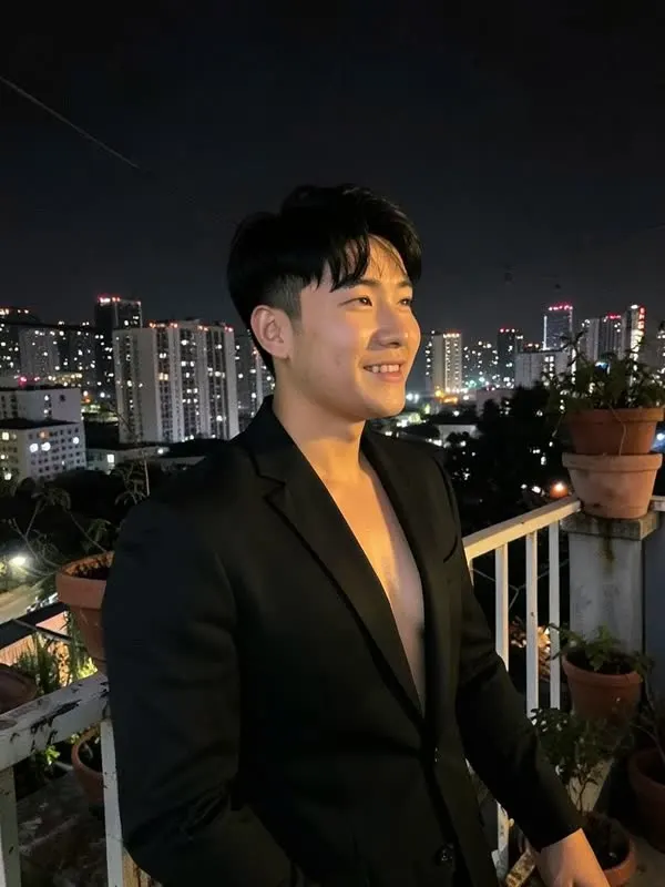 Male AI model in a suit at night